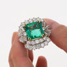 6.26 Carat Emerald Cut Emerald with Trillion and Round Cut Diamond Side Stone Ring in 18K White, Yellow Gold