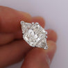 7.68ct TW Radiant & Trillion Cut Three Stone Engagement Ring