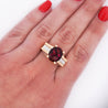 GIA Certified Oval Cut 7 Carat Purplish Red Tourmaline Ring with Diamond Sides in 18K Gold