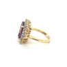 Vivid Pink 7 Carat Radiant Cut Tourmaline Ring with Round Diamond Halo in 18K Gold