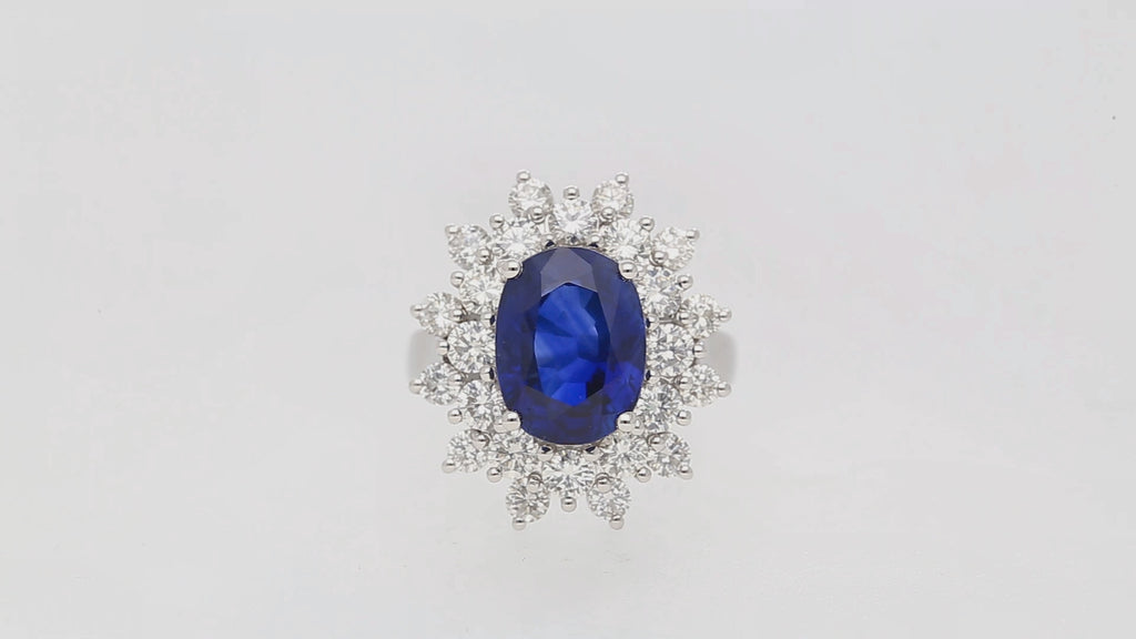 GRS Certified 5.79 Carat Oval Royal Blue Sapphire and Diamond Halo Ring